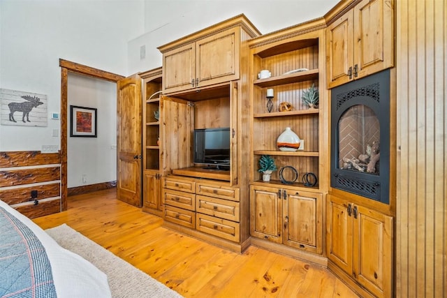 bedroom with light wood-type flooring