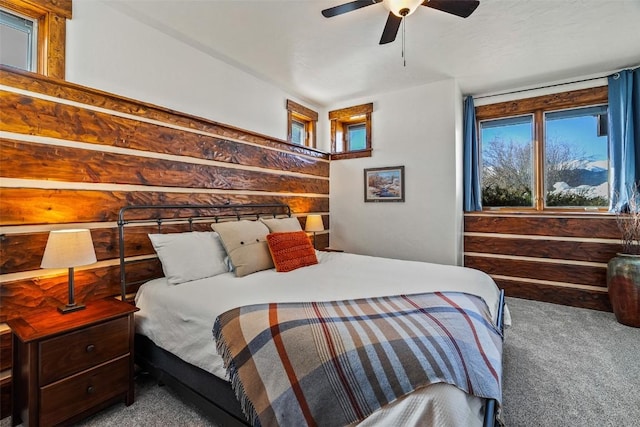 bedroom featuring ceiling fan and carpet flooring