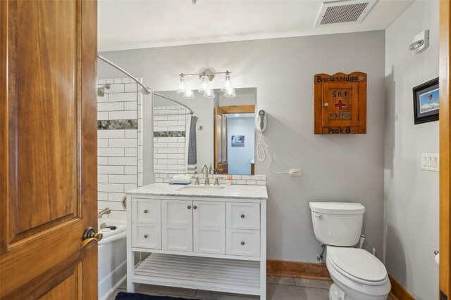 53 Hunki Dori Ct Unit 8806, Keystone, CO 80435 - bathroom featuring washtub / shower combination, tile patterned flooring, visible vents, toilet, and vanity
