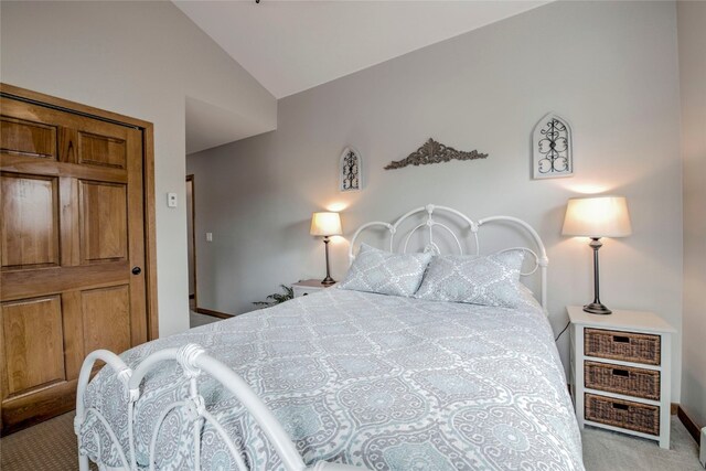 116 Blue Grouse Ln, Silverthorne, CO 80498 - bedroom featuring carpet and vaulted ceiling