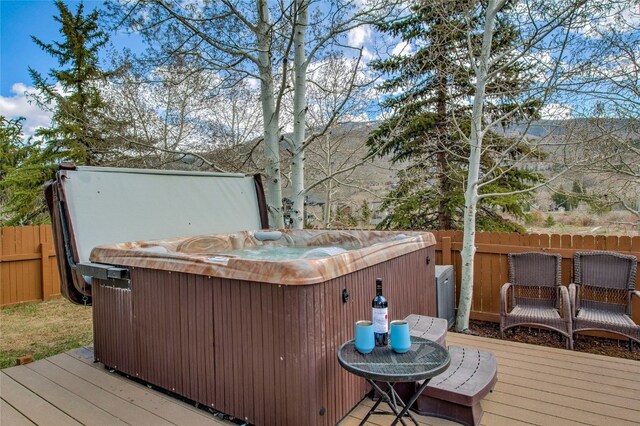 116 Blue Grouse Ln, Silverthorne, CO 80498 - wooden terrace featuring a hot tub