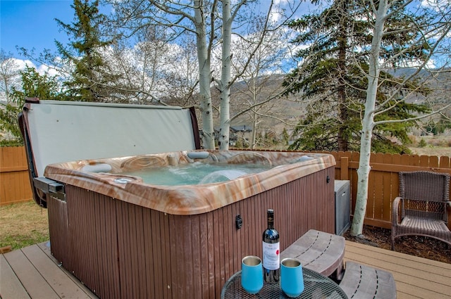 116 Blue Grouse Ln, Silverthorne, CO 80498 - wooden terrace featuring a hot tub