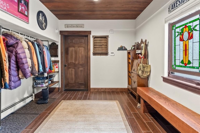 44 Maverick Way, Silverthorne, CO 80498 - mudroom with wood ceiling, a baseboard heating unit, wood tiled floors, and baseboards