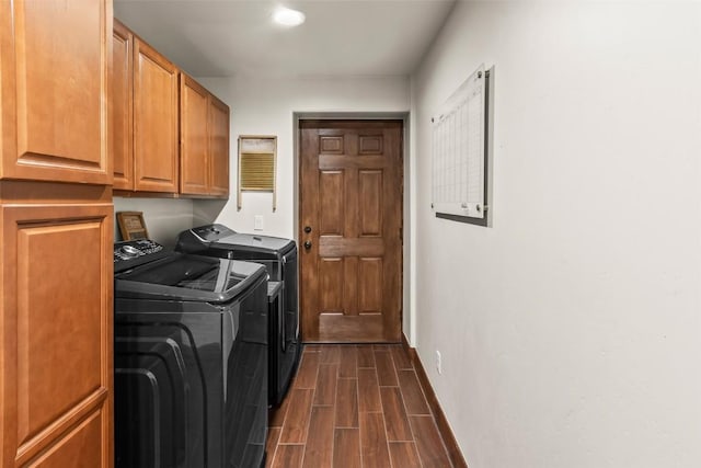 44 Maverick Way, Silverthorne, CO 80498 - washroom with washer and dryer, cabinet space, wood tiled floors, and baseboards