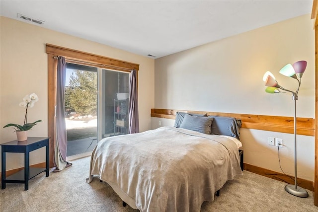 471 Mountain Vista Cir Unit 1, Steamboat Springs, CO 80487 - carpeted bedroom with access to exterior and baseboards