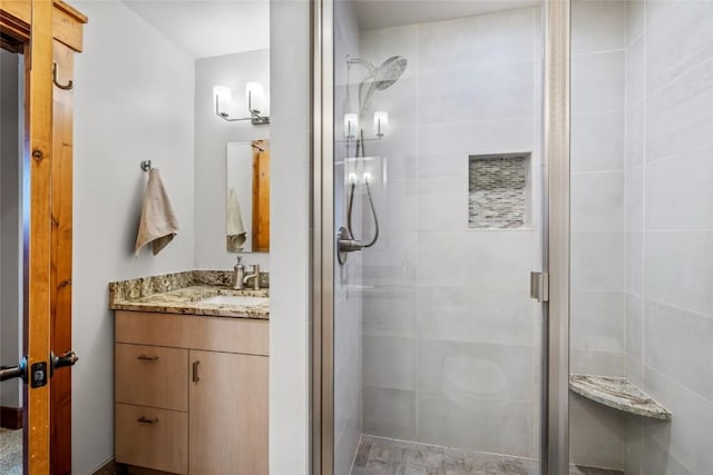 471 Mountain Vista Cir Unit 1, Steamboat Springs, CO 80487 - bathroom featuring a stall shower and vanity