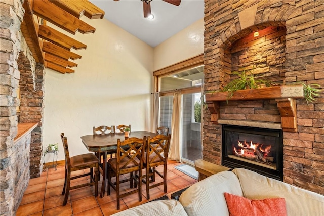 471 Mountain Vista Cir Unit 1, Steamboat Springs, CO 80487 - tiled dining room with a stone fireplace and a ceiling fan