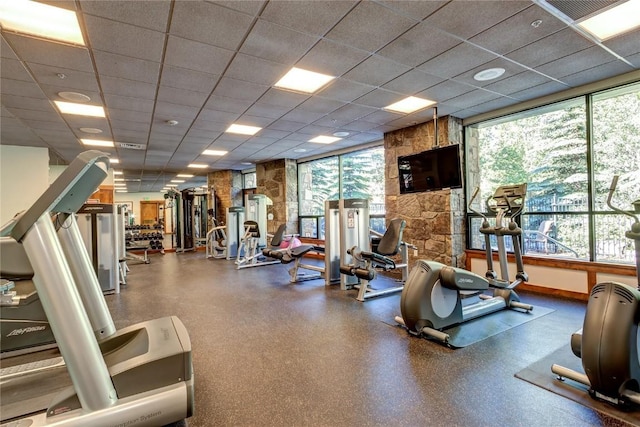 505 S Main St Unit 2305, Breckenridge, CO 80424 - exercise room featuring healthy amount of natural light, a drop ceiling, and baseboards