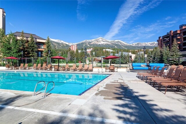 505 S Main St Unit 2305, Breckenridge, CO 80424 - community pool with a mountain view and a patio area