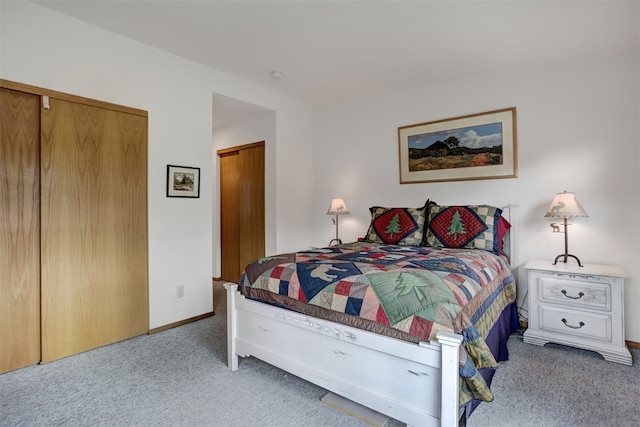 400 Bayview Dr Unit D, Frisco, CO 80443 - bedroom with carpet, baseboards, and a closet