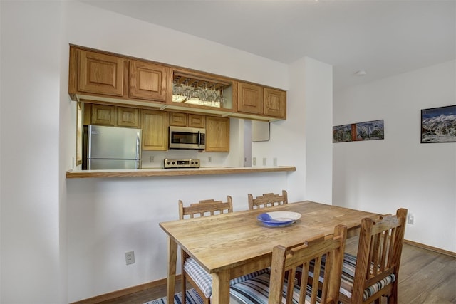 400 Bayview Dr Unit D, Frisco, CO 80443 - dining space featuring wood finished floors and baseboards