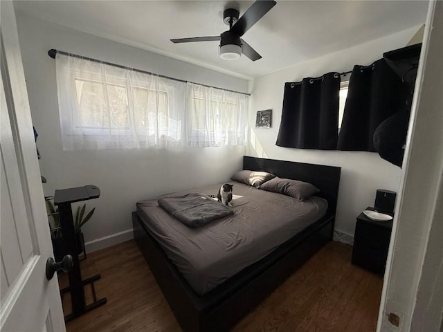 215 Colorado Blvd, Idaho Springs, CO 80452 - bedroom with wood finished floors, a ceiling fan, and baseboards
