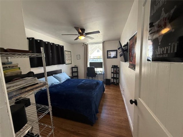215 Colorado Blvd, Idaho Springs, CO 80452 - bedroom with wood finished floors, baseboards, and ceiling fan