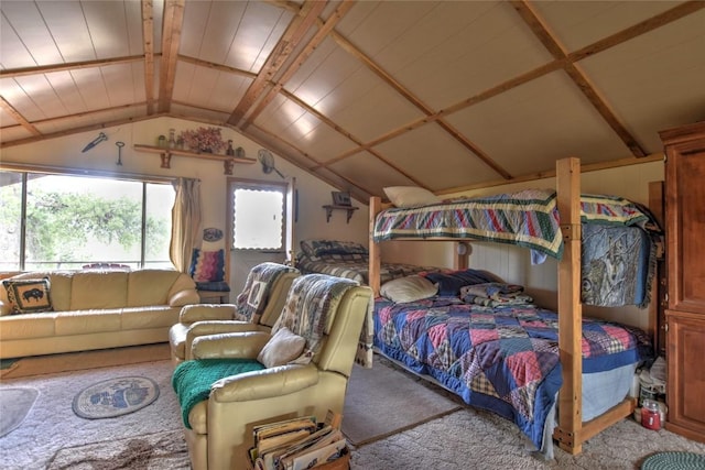 carpeted bedroom with vaulted ceiling