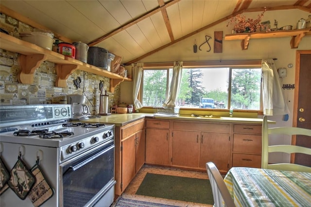kitchen featuring open shelves, wooden ceiling, lofted ceiling, and gas range