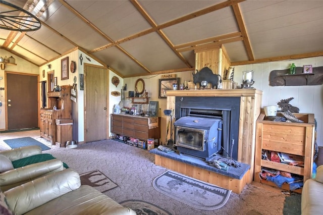 carpeted living room with lofted ceiling and a wood stove