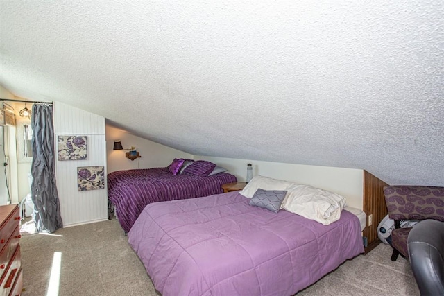 7237 Ryan Gulch Rd Unit 307, Silverthorne, CO 80498 - bedroom with carpet, a textured ceiling, and vaulted ceiling