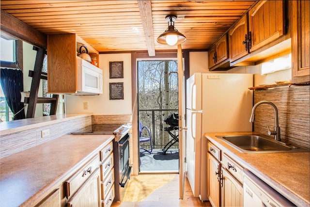 7237 Ryan Gulch Rd Unit 307, Silverthorne, CO 80498 - kitchen featuring white appliances, wooden ceiling, a sink, light wood-type flooring, and light countertops