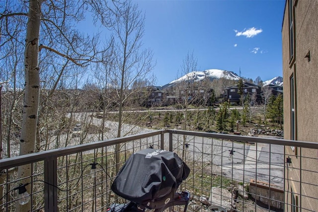 7237 Ryan Gulch Rd Unit 307, Silverthorne, CO 80498 - balcony featuring a mountain view and area for grilling