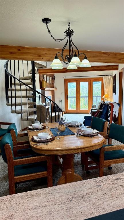 9430 Ryan Gulch Rd Unit 9453, Silverthorne, CO 80498 - dining space featuring stairs