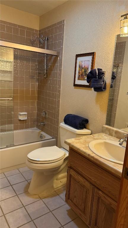 9430 Ryan Gulch Rd Unit 9453, Silverthorne, CO 80498 - full bath featuring tile patterned floors, toilet, shower / washtub combination, and vanity