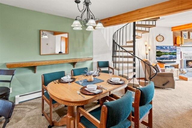 9430 Ryan Gulch Rd Unit 9453, Silverthorne, CO 80498 - carpeted dining space featuring a baseboard radiator, stairs, and a chandelier