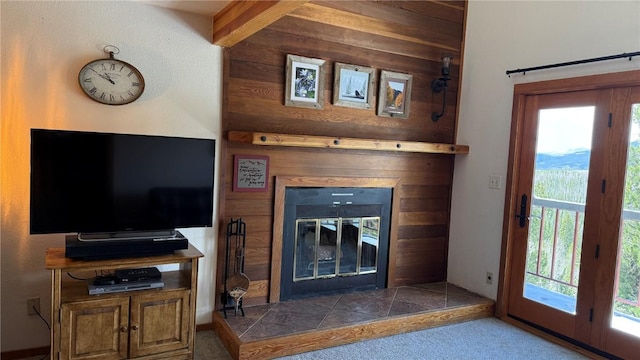 9430 Ryan Gulch Rd Unit 9453, Silverthorne, CO 80498 - carpeted living area with a tile fireplace and plenty of natural light