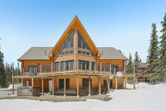 306 Robertson Ln, Breckenridge, CO 80424 - snow covered property with a hot tub, log siding, a deck, and cooling unit