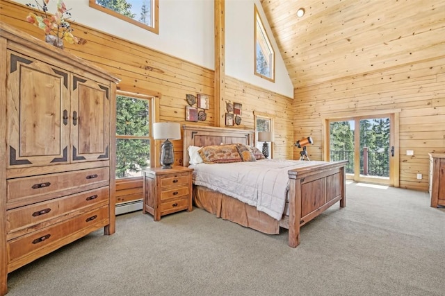 306 Robertson Ln, Breckenridge, CO 80424 - bedroom with light carpet, access to exterior, wood walls, a baseboard heating unit, and high vaulted ceiling