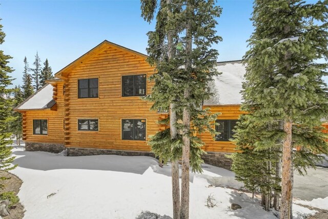 306 Robertson Ln, Breckenridge, CO 80424 - view of snow covered exterior featuring a patio