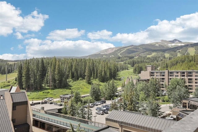 property view of mountains featuring a wooded view