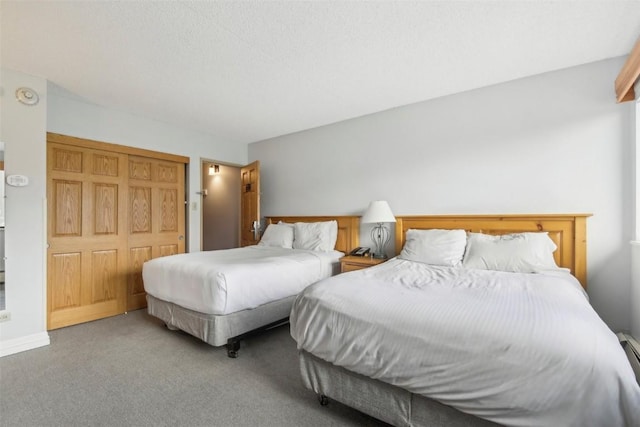 bedroom with carpet floors and a closet