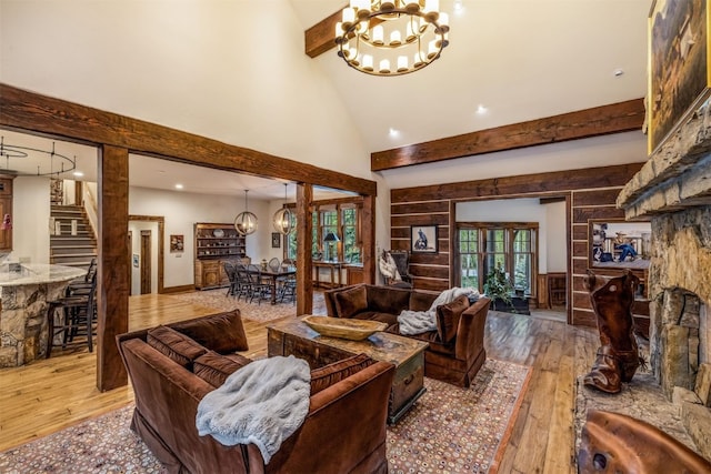 215 Royal Tiger Rd, Breckenridge, CO 80424 - living area featuring a chandelier, wood-type flooring, beamed ceiling, stairway, and recessed lighting