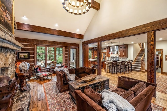 215 Royal Tiger Rd, Breckenridge, CO 80424 - living area featuring wood-type flooring, beamed ceiling, recessed lighting, a chandelier, and high vaulted ceiling