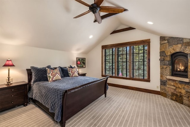 215 Royal Tiger Rd, Breckenridge, CO 80424 - bedroom with light colored carpet, lofted ceiling, a ceiling fan, a fireplace, and recessed lighting