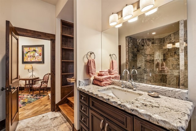 215 Royal Tiger Rd, Breckenridge, CO 80424 - bathroom with vanity and a tile shower