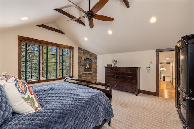 215 Royal Tiger Rd, Breckenridge, CO 80424 - bedroom featuring lofted ceiling, recessed lighting, ceiling fan, light carpet, and a fireplace