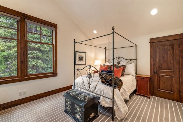 215 Royal Tiger Rd, Breckenridge, CO 80424 - carpeted bedroom with lofted ceiling and recessed lighting