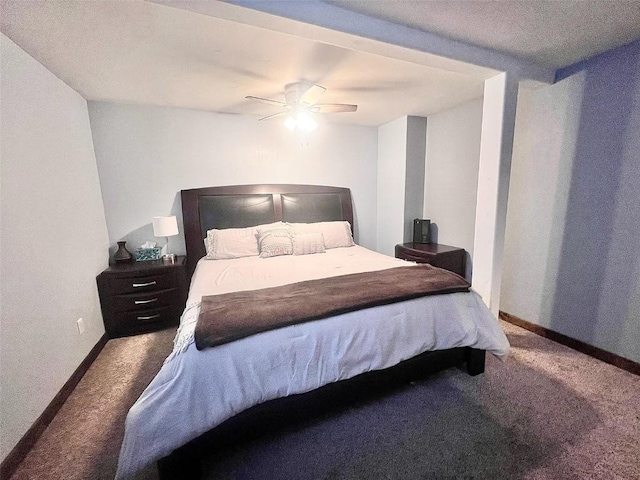 158 Oak Ridge Cir, Oak Creek, CO 80467 - bedroom with carpet floors, baseboards, and a ceiling fan