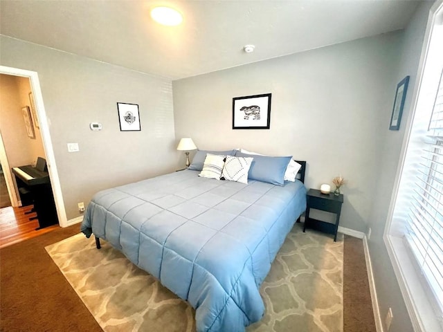158 Oak Ridge Cir, Oak Creek, CO 80467 - carpeted bedroom featuring baseboards