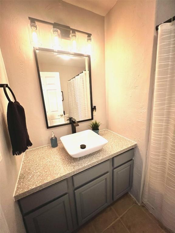 158 Oak Ridge Cir, Oak Creek, CO 80467 - full bathroom featuring vanity and tile patterned flooring