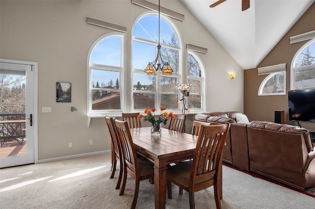 481 Marmot Cir, Silverthorne, CO 80498 - carpeted dining area featuring baseboards, high vaulted ceiling, a healthy amount of sunlight, and ceiling fan