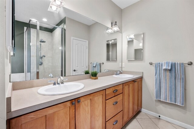 481 Marmot Cir, Silverthorne, CO 80498 - bathroom with a stall shower, tile patterned flooring, and a sink