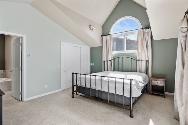 481 Marmot Cir, Silverthorne, CO 80498 - carpeted bedroom featuring lofted ceiling, ensuite bathroom, baseboards, and a closet