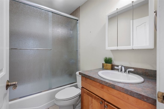 481 Marmot Cir, Silverthorne, CO 80498 - bathroom with bath / shower combo with glass door, toilet, and vanity