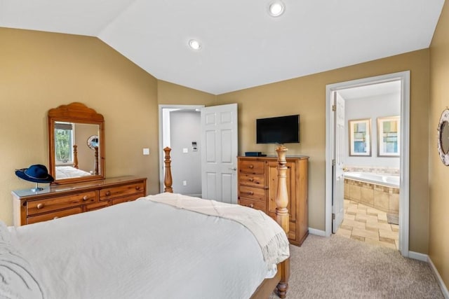 2840 Kitzbuhel Ct Unit 2, Steamboat Springs, CO 80487 - bedroom featuring lofted ceiling, baseboards, light carpet, ensuite bath, and recessed lighting