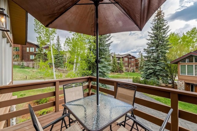 2840 Kitzbuhel Ct Unit 2, Steamboat Springs, CO 80487 - wooden terrace with outdoor dining area