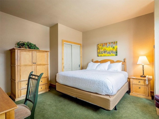 2300 Mt Werner Cir Unit 226/227Qiv, Steamboat Springs, CO 80487 - bedroom featuring dark colored carpet and a closet