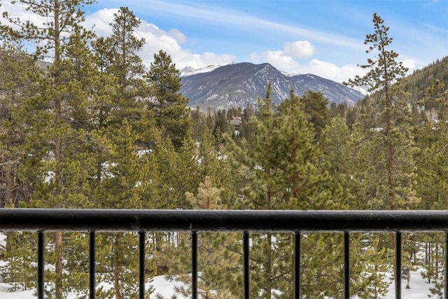 property view of mountains featuring a view of trees