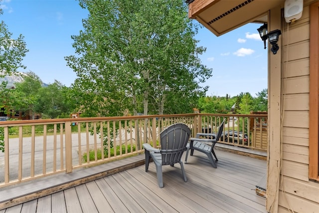 336 N Chipmunk Cir, Silverthorne, CO 80498 - wooden terrace featuring view of scattered trees